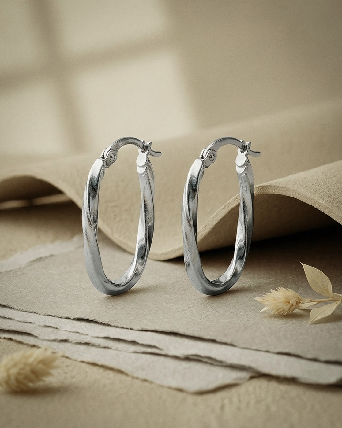 Rhodium Plated Oval Twisted Hoop Earring