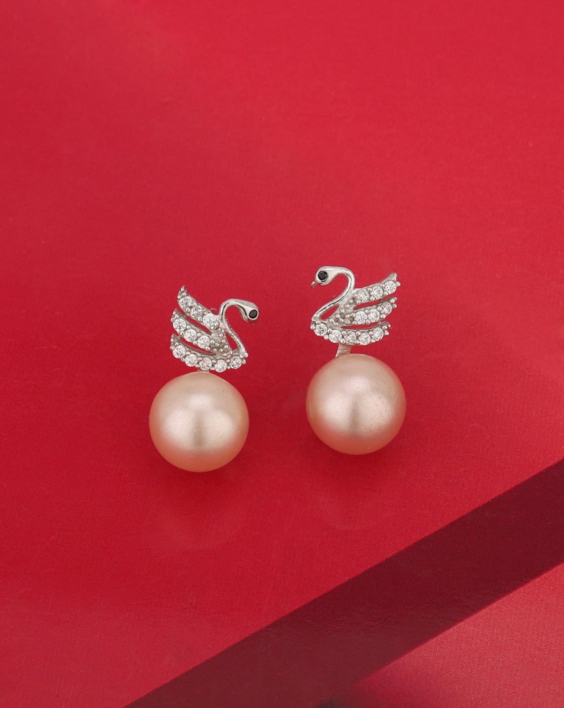 Carlton London Rhodium Plated Peach Coloured Pearl Cz Swan Stud Earring