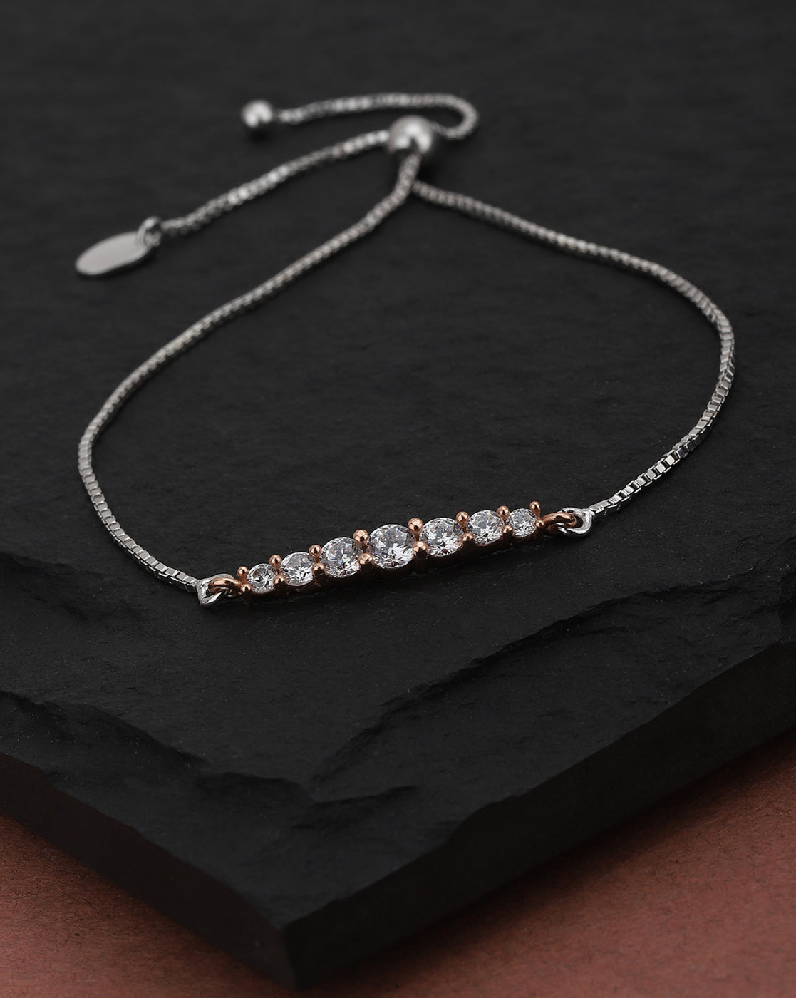 Carlton London Rose Gold Plated Cz Studded Charm Bracelet For Women