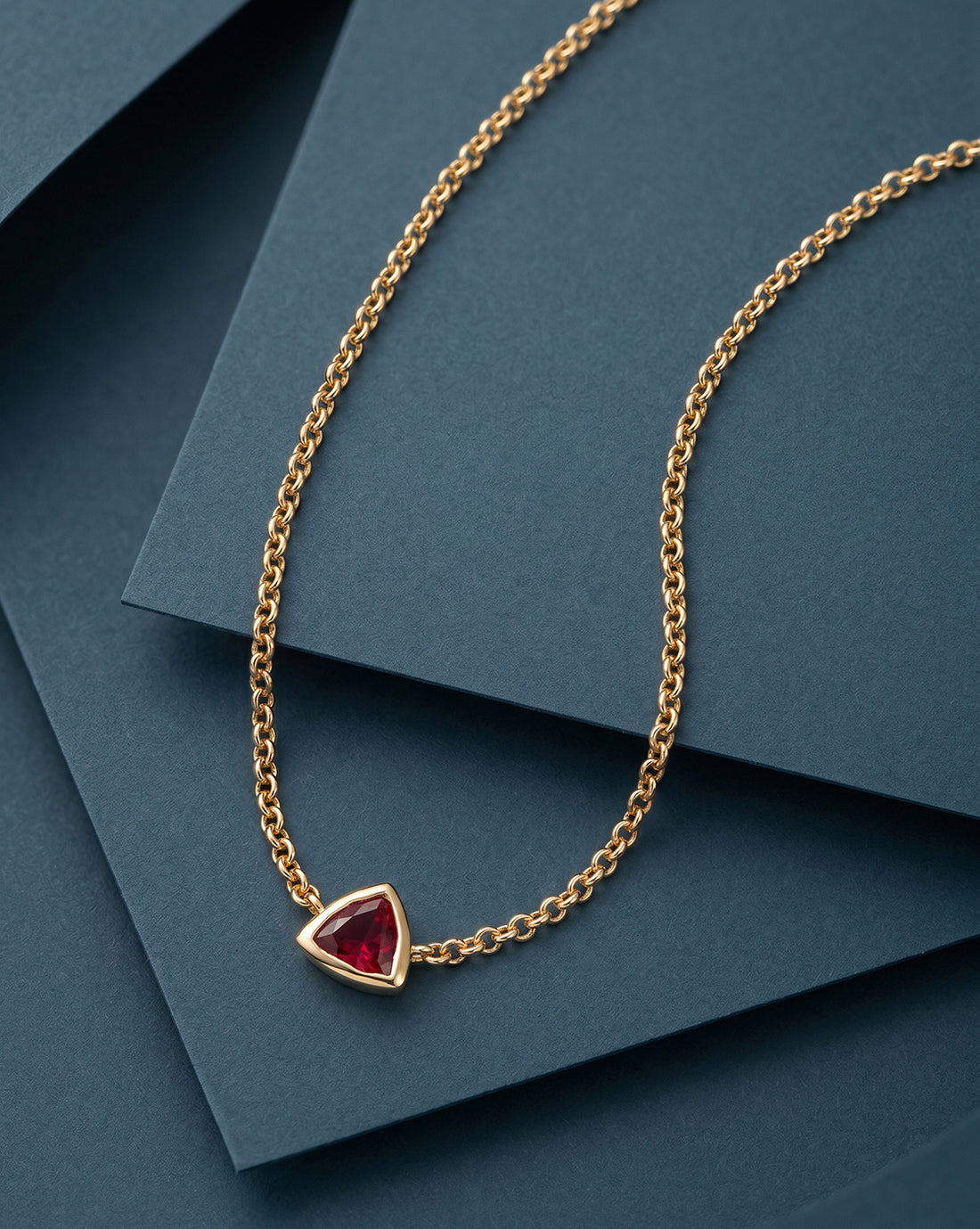 18kt Gold Plated Ruby Studded Trillion Solitaire Pendant Necklace