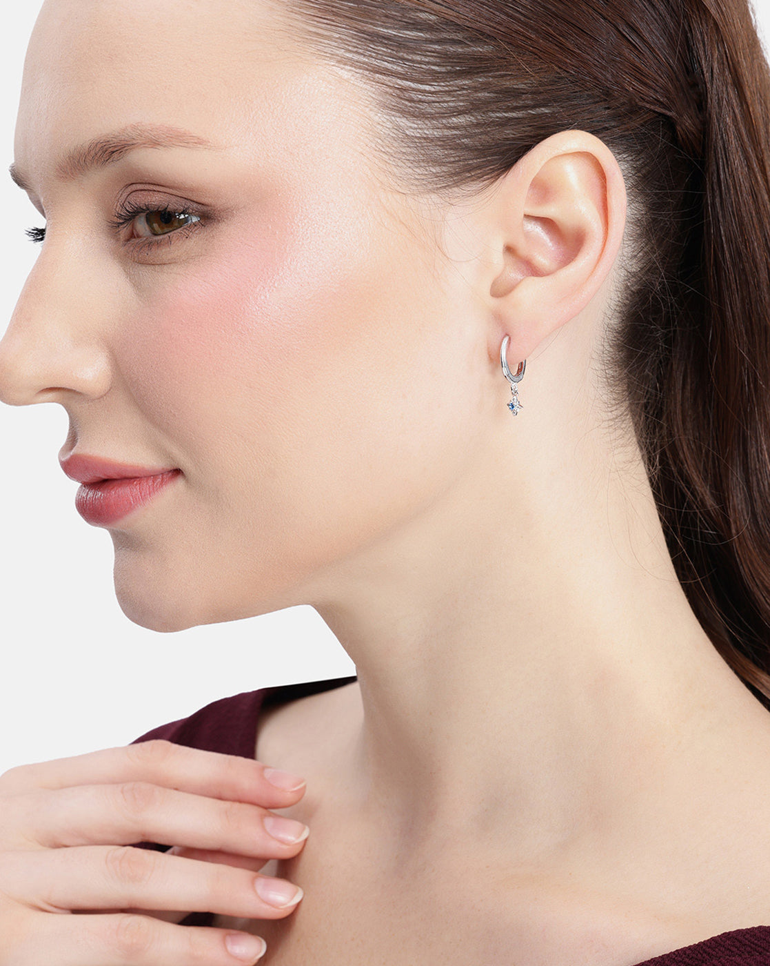 Rhodium Plated Dangling Blue Topaz Mini Hoop Earring