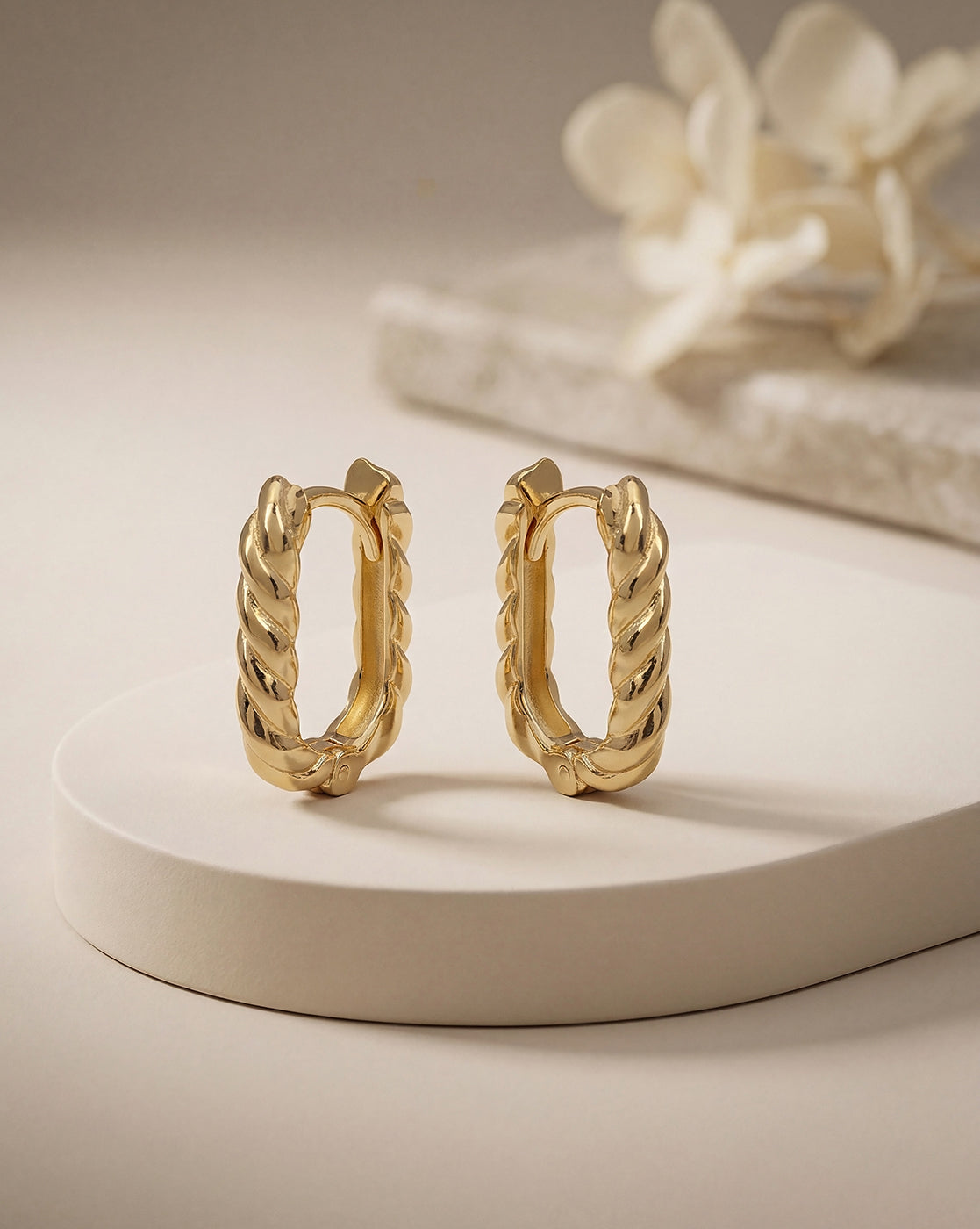 18kt Gold Plated Twisted Oval Hoop Earring