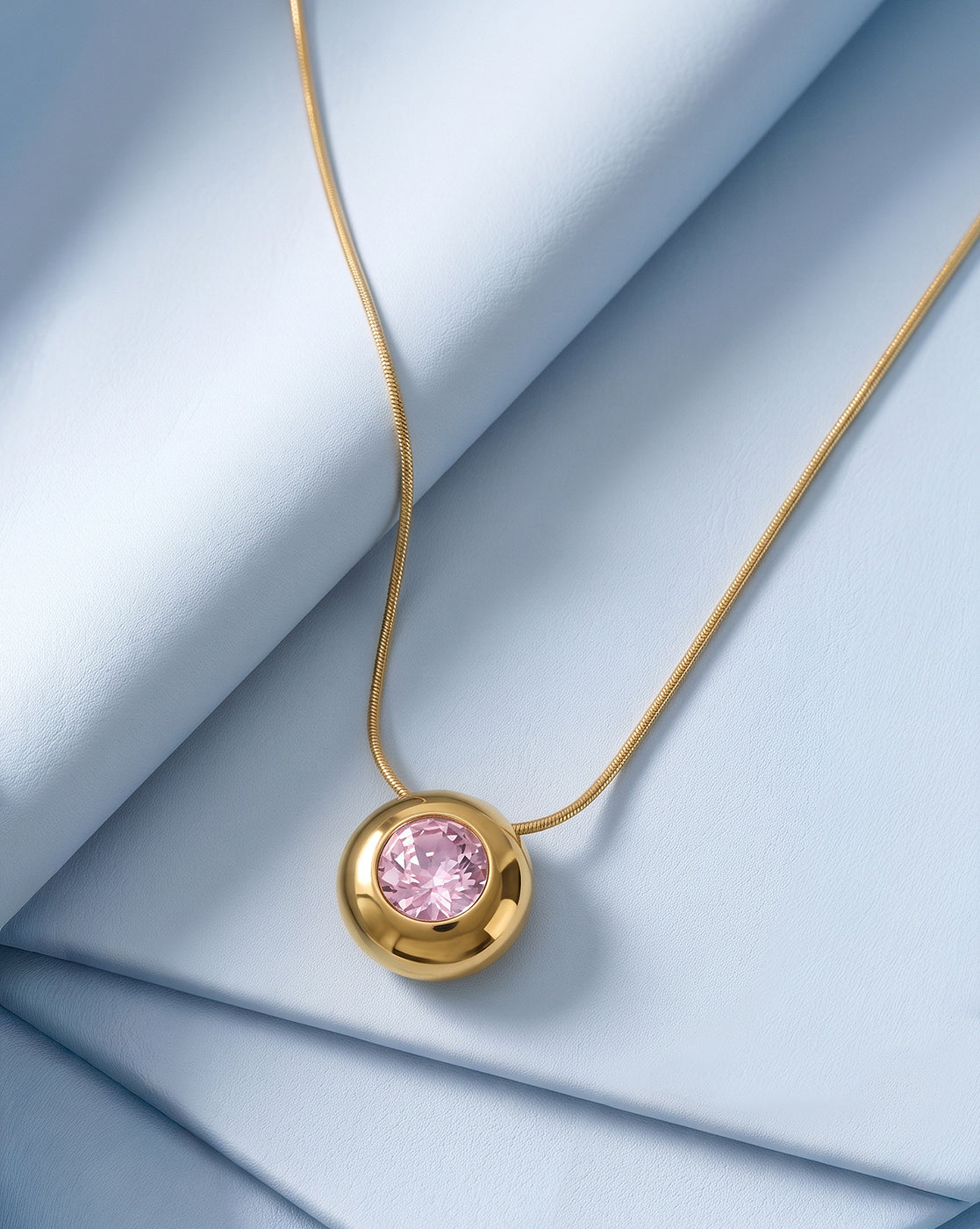 Gold Plated Pink Solitaire Studded Round Pendant and Snake Chain