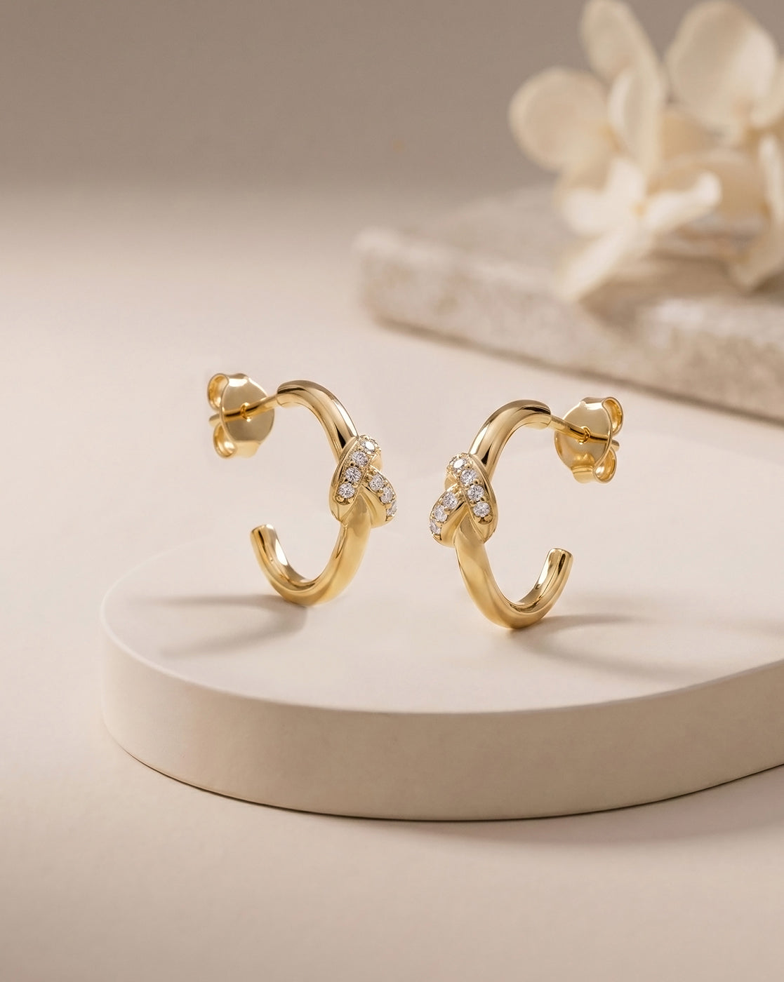 18kt Gold Plated CZ Trendy Knot Half Hoop Earring