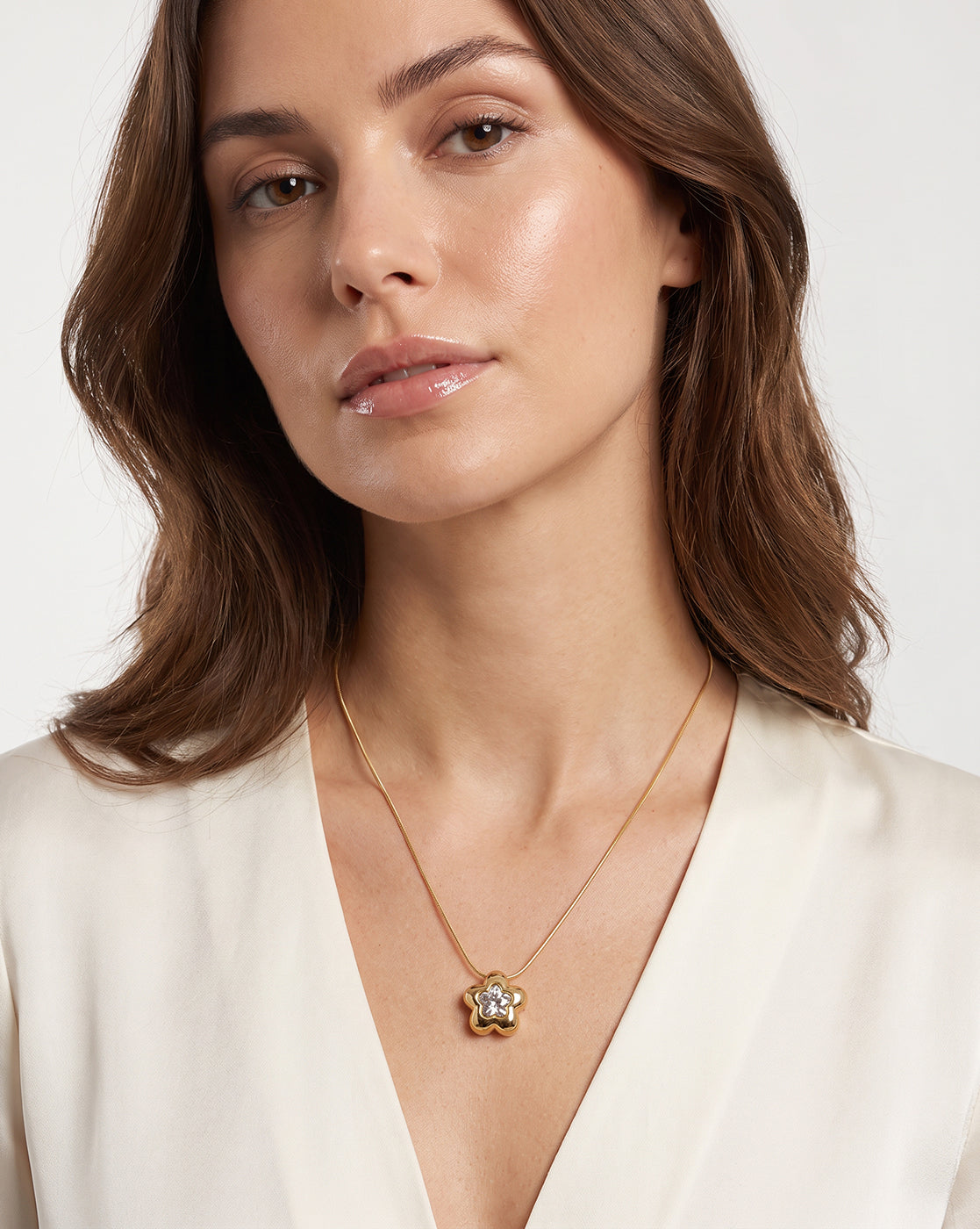 Gold Plated Elegant Floral Solitaire Studded Pendant and Snake Chain