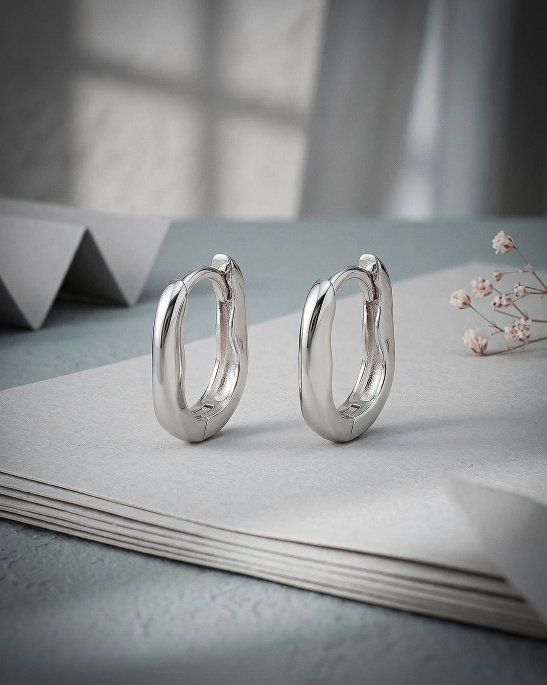Rhodium Plated Oval Mini Hoop Earring