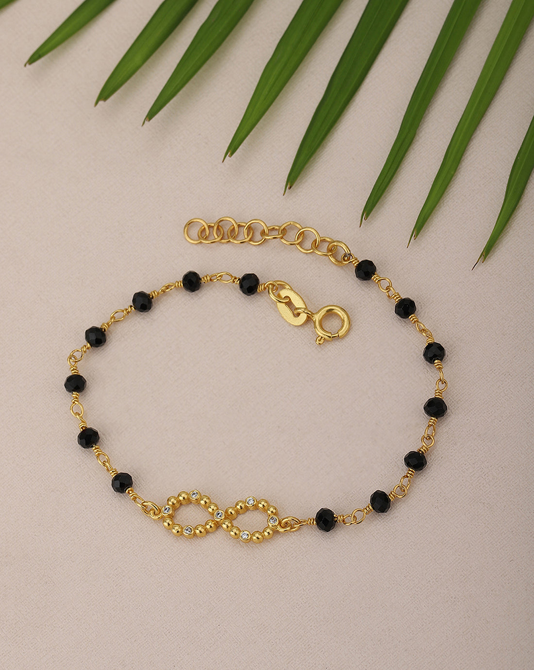 Carlton London Gold Plated Black Cz Studded Infinity Bracelet