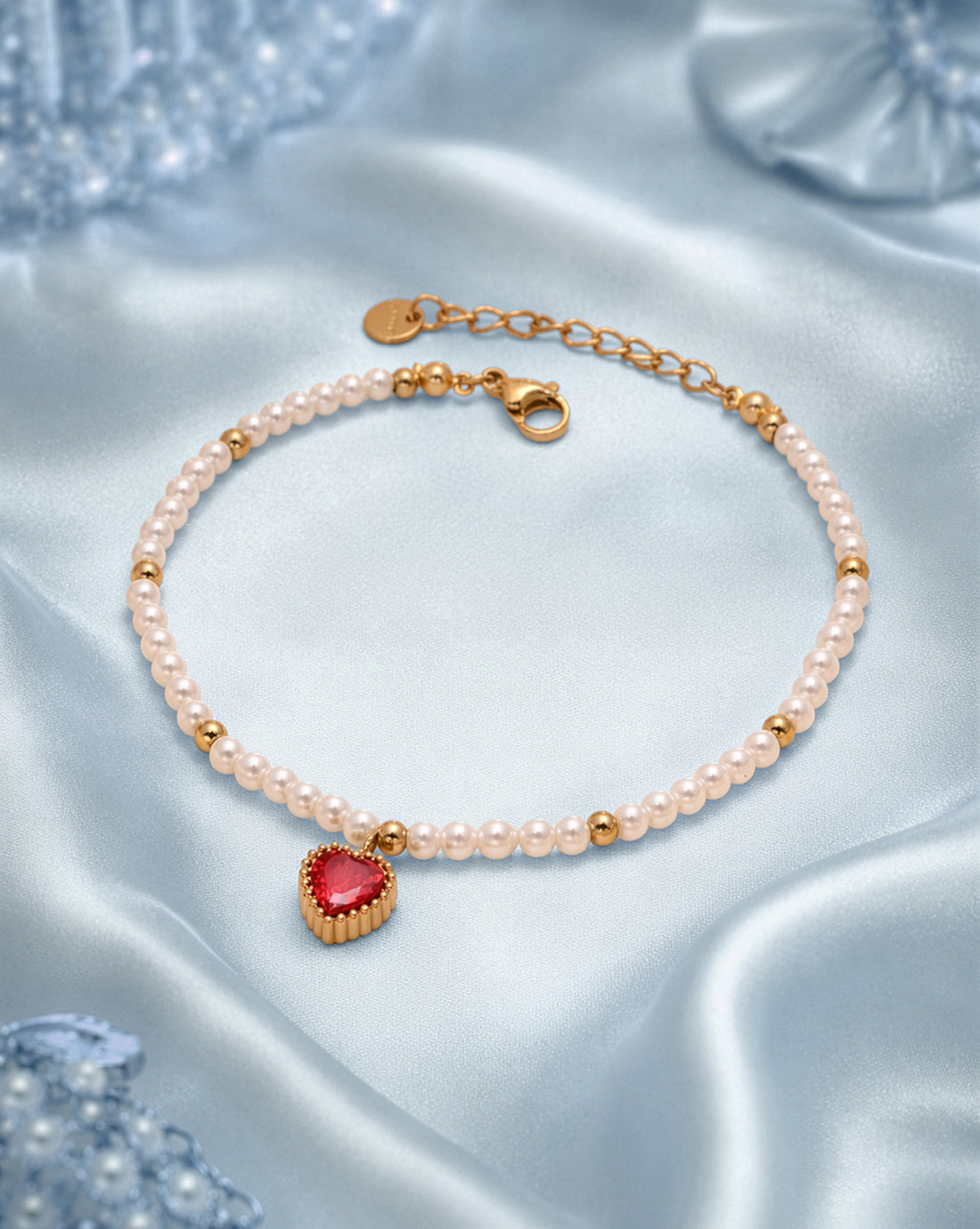 18kt Gold Plated Pearl and Dangling Heart Solitaire Charm Bracelet