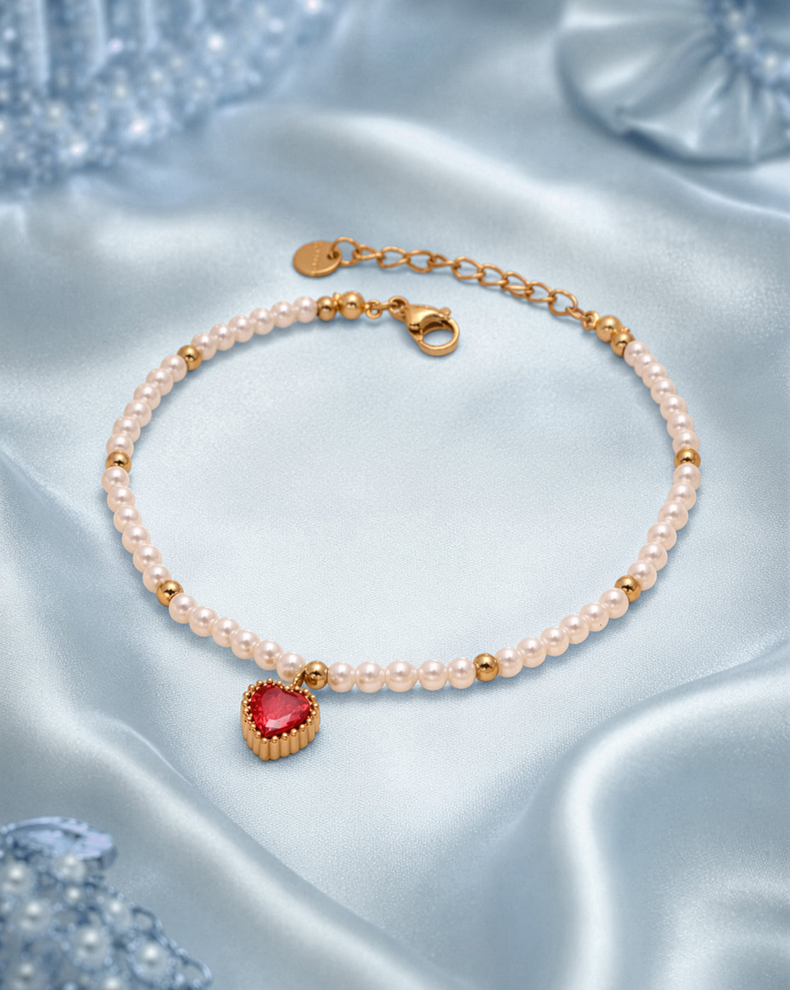 18kt Gold Plated Pearl and Dangling Heart Solitaire Charm Bracelet