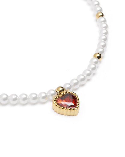 18kt Gold Plated Pearl and Dangling Heart Solitaire Charm Bracelet