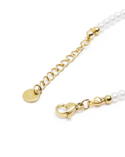 18kt Gold Plated Pearl and Dangling Heart Solitaire Charm Bracelet