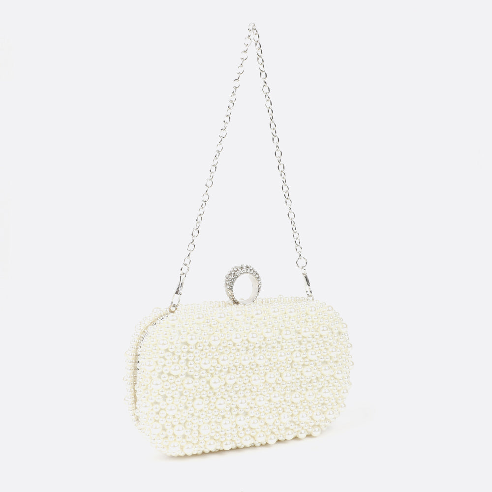 Carlton London sling bag with pearl embellishment and chain sling. 