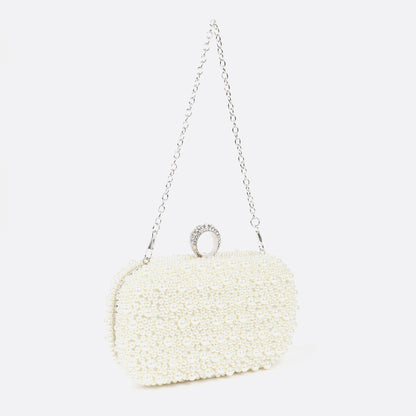 Carlton London sling bag with pearl embellishment and chain sling. 